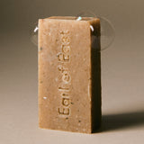Close-up view of Earl of East Shinrin-Yoku Cleansing Soap Bar showing natural texture and earthy tones, inspired by forest bathing.