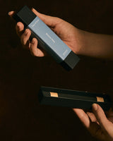 Professional product shot of Earl of East Shinrin-Yoku incense sticks with dark background
