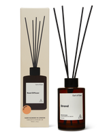 Strand Reed Diffuser 150ml by Earl of East in amber glass bottle with reeds
