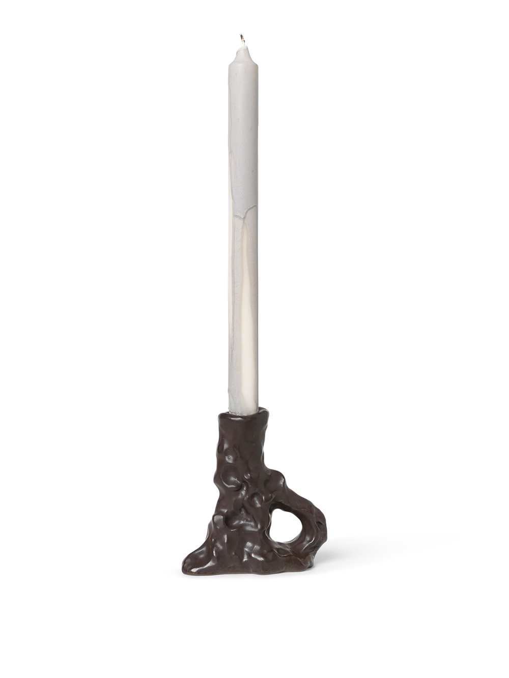Single Dito Candle Holder, Dark Brown by ferm LIVING, holding a taper candle
