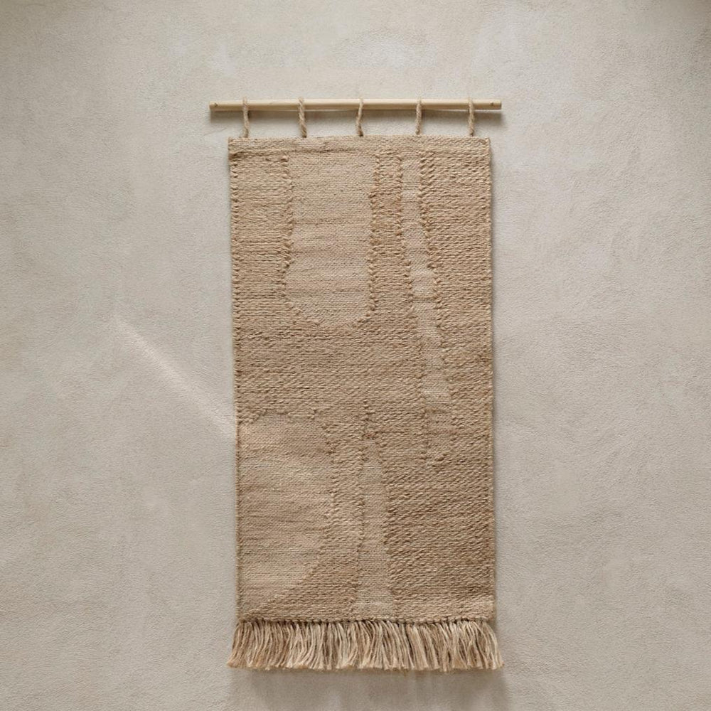 Harvest Wall Rug, Small by ferm LIVING, hanging on a white wall