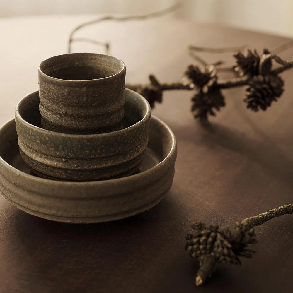 Serena Bowl, Ø18, Green by ferm LIVING, stacked with other tableware