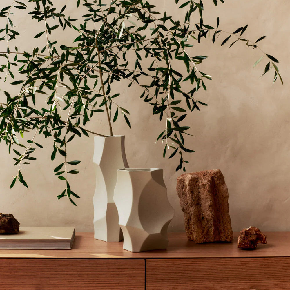 Cueva Vase, H26, Off-white by ferm LIVING, holding olive branches on a sideboard