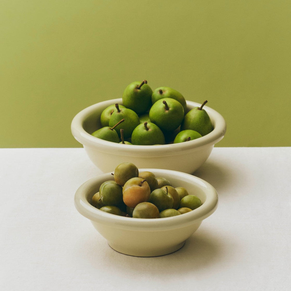 Barro Salad Bowl, Large, Pistachio by HAY, filled with olives on a pistachio backdrop