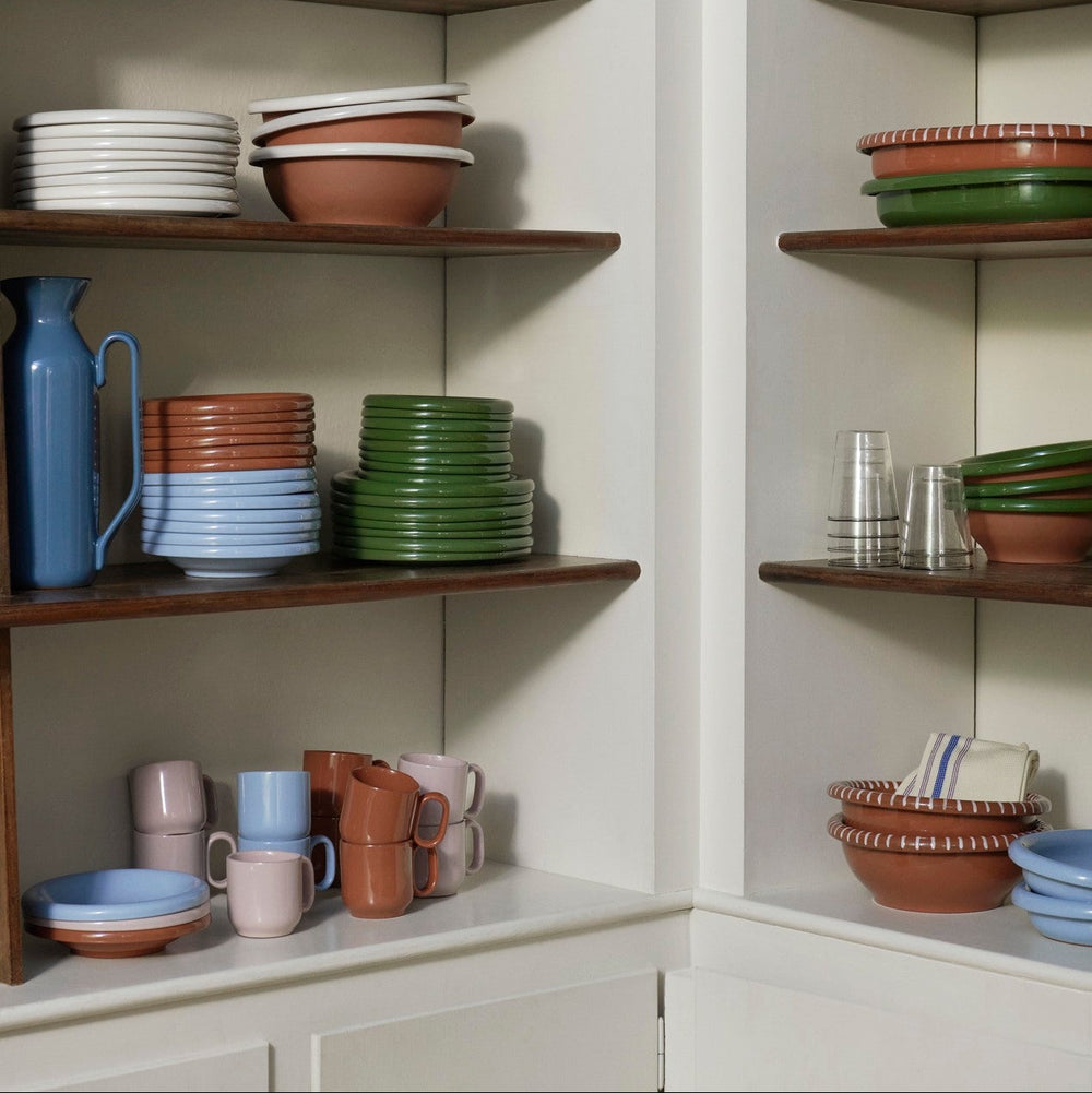 Barro Cup Set of Two, Pink by HAY, on open kitchen shelves