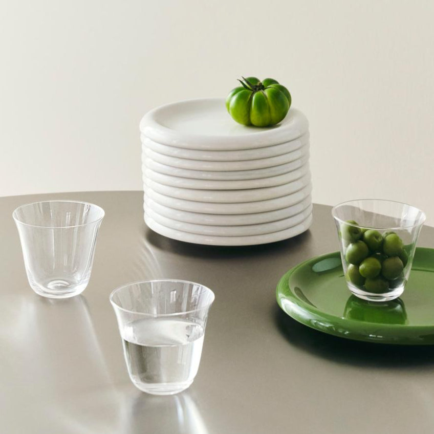 Curve Tumbler Glasses, Set of Two, Clear by HAY, with plates and herbs