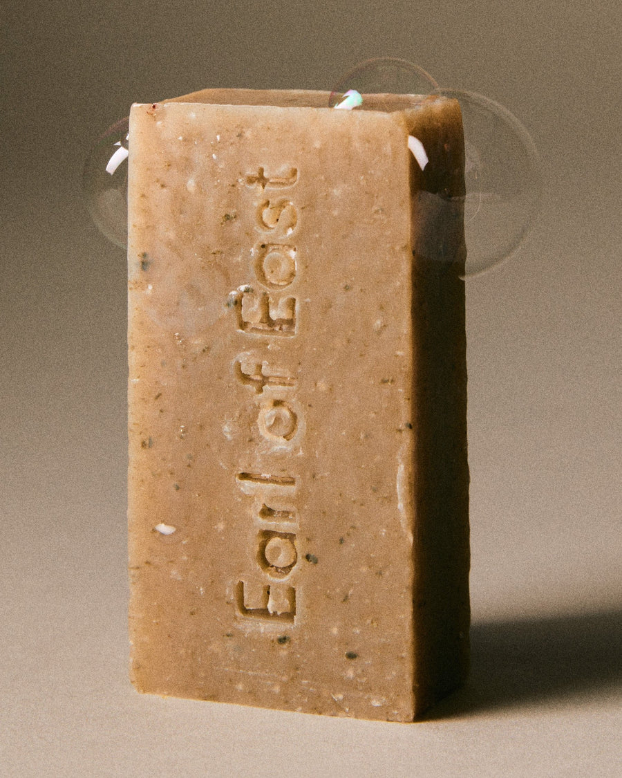 Close-up view of Earl of East Shinrin-Yoku Cleansing Soap Bar showing natural texture and earthy tones, inspired by forest bathing.