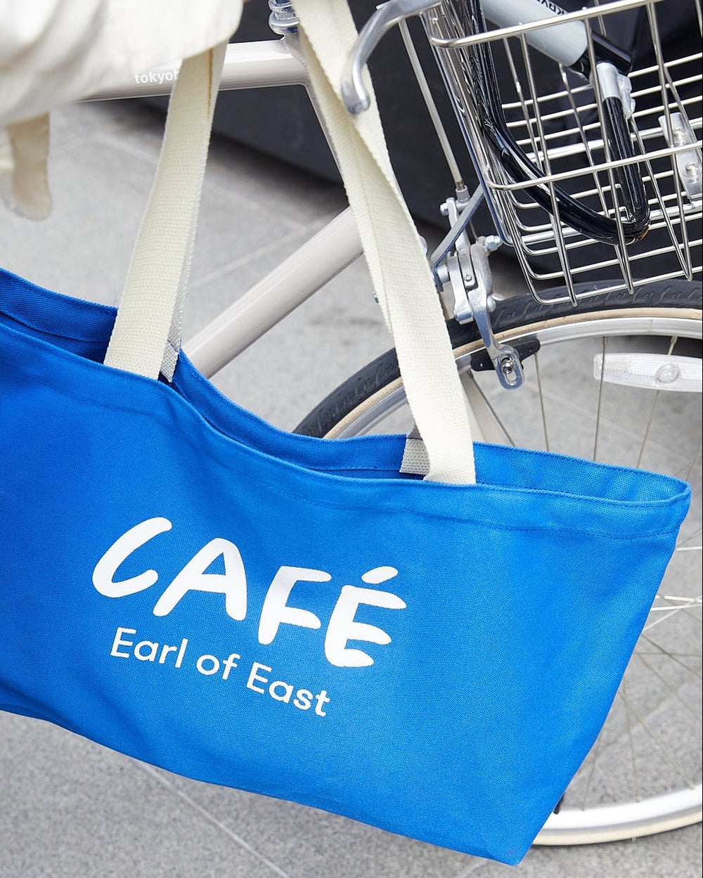 Café Canvas Market Bag, Blue by Earl of East, being carried
