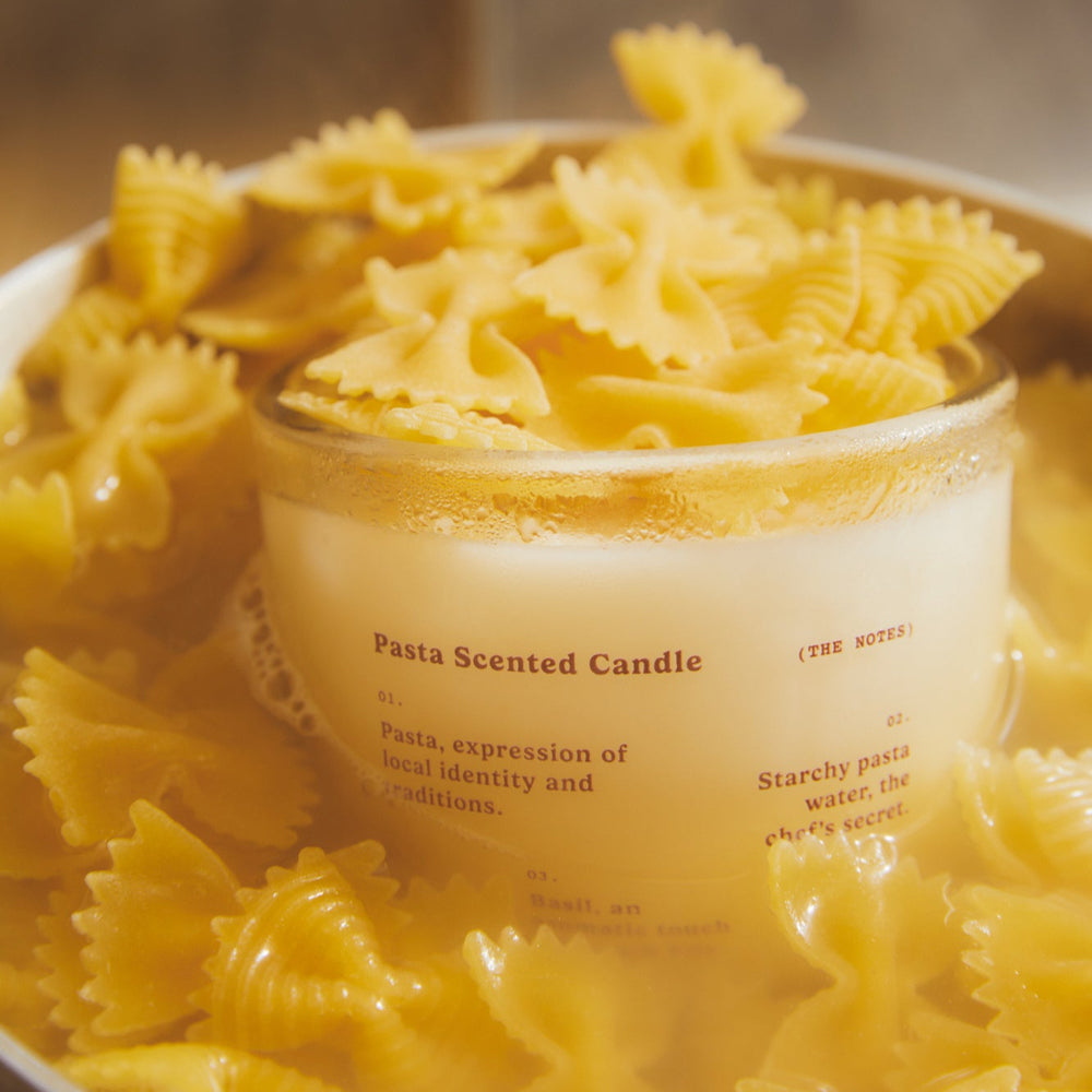 Pasta Scented Candle, 250ml by Earl of East, surrounded by farfalle pasta