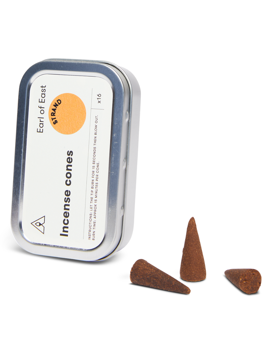 Strand Incense Cones, Pack of 3 by Earl of East, tin open with cones beside it