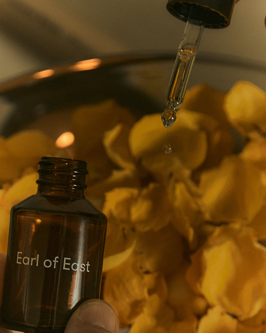 Jardin de la Lune Fragrance Oil Blend, 30ml by Earl of East, among dried yellow petals