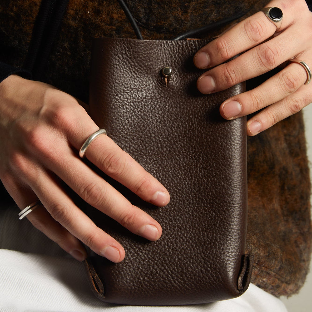 Leather Jigsaw Pouch, Tumbled Brown by Earl of East x Kate Sheridan, held in hand