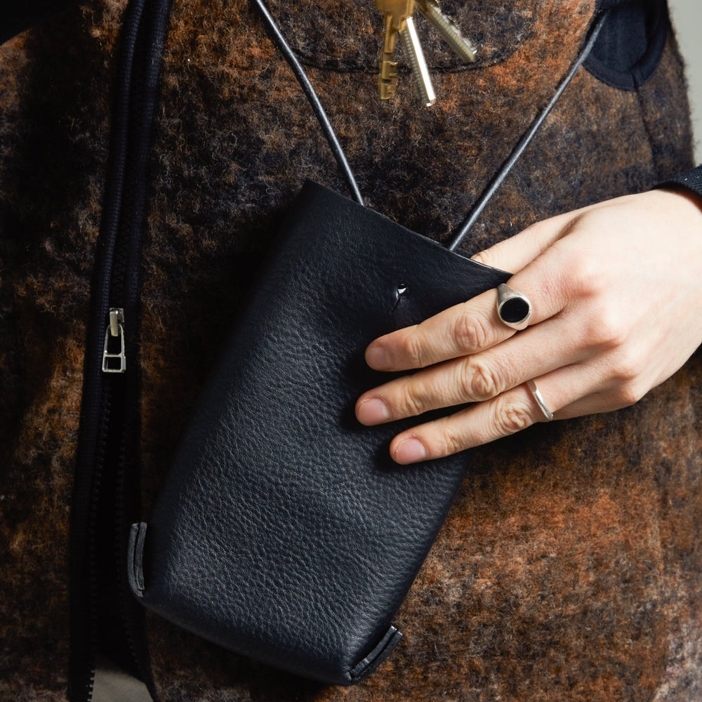 Leather Jigsaw Pouch, Tumbled Black by Earl of East x Kate Sheridan, worn cross-body