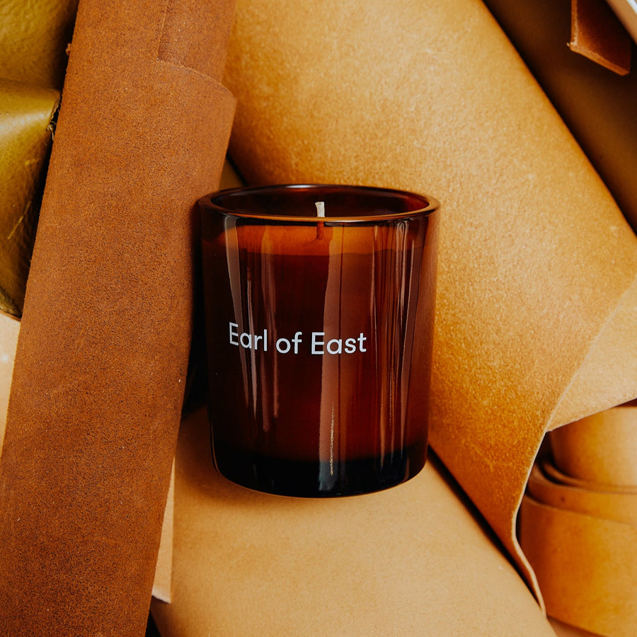 Elementary, Soy Wax Candle, 260ml [9.1oz] by Earl of East, lit in warm light