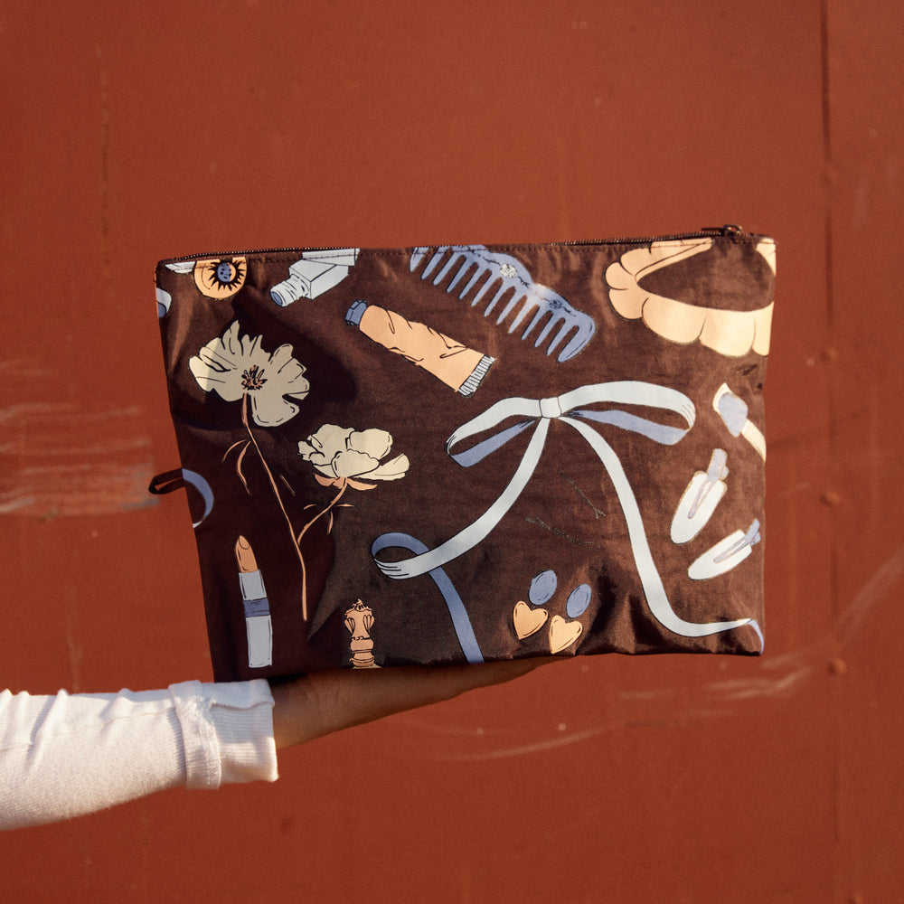 Go Pouch Set, Get Ready With Me by Baggu, on a rust background
