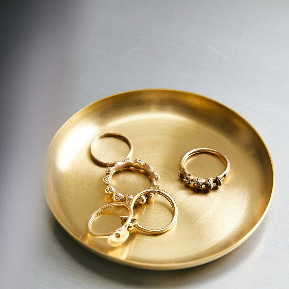Basho Tray Round, Brass by ferm LIVING, holding gold rings