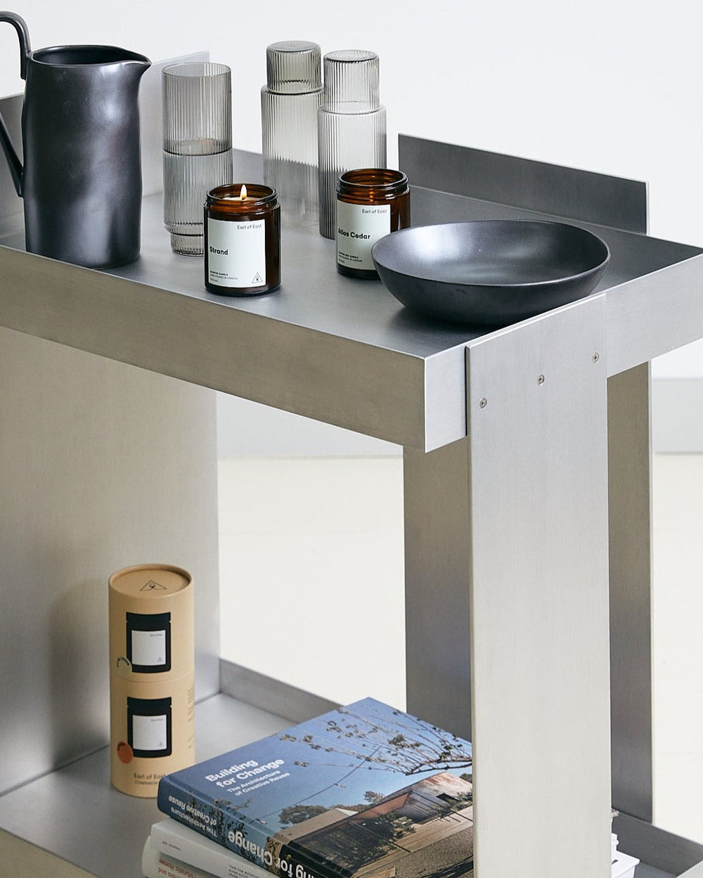 Lager Trolley, Aluminium by ferm LIVING, holding magazines and a bowl