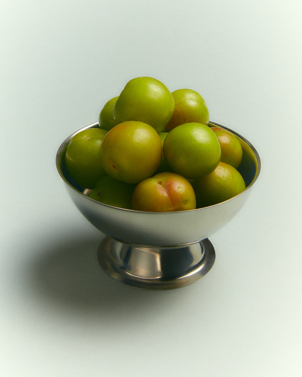 Ice Cream Cup, Stainless Steel by Earl of East, holding green olives