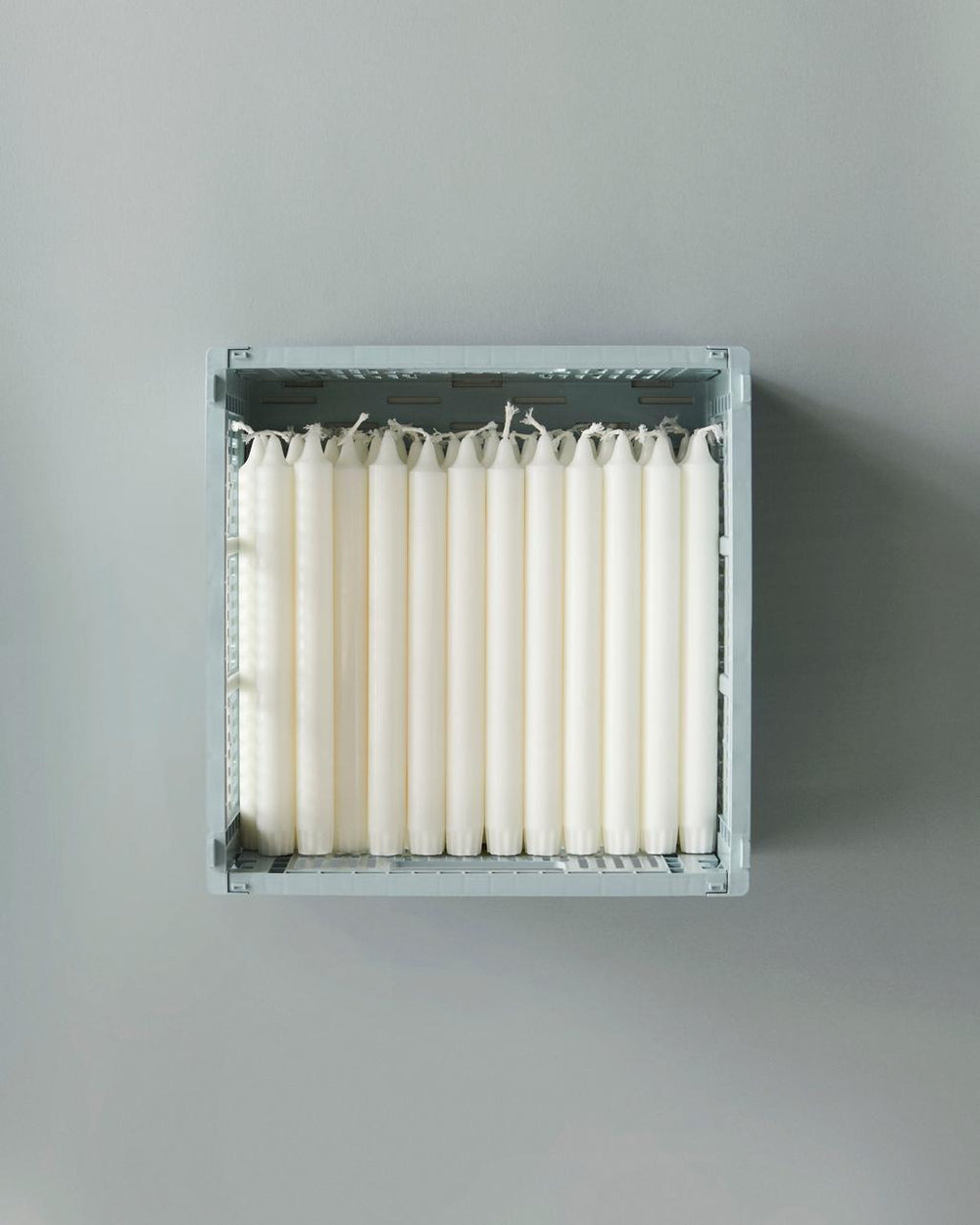 Colour Crate, Small, Soft Blue by HAY, holding candles