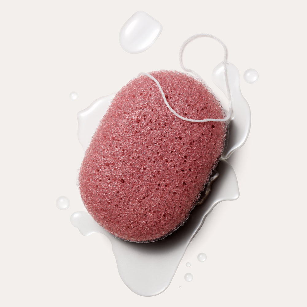 Exfoliating Facial Konjac Sponge, Pack of 2 by Neighbourhood Botanicals, with water droplets