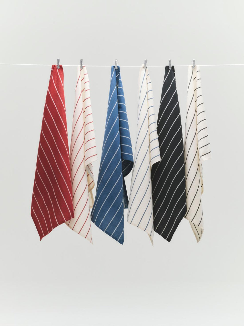 Outdoor Market Tea Towel, Set of 2, Blue & Beige by HAY, hanging in a range of colours