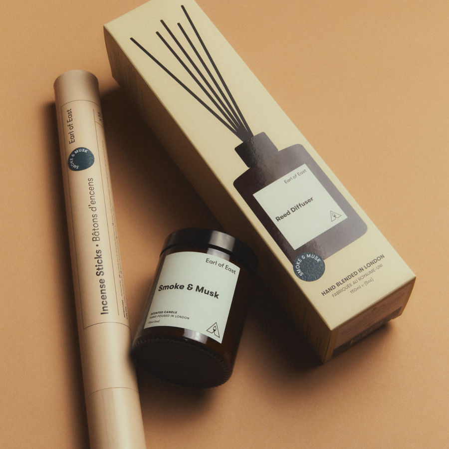Smoke & Musk Scent Layering Set by Earl of East, on a tan background