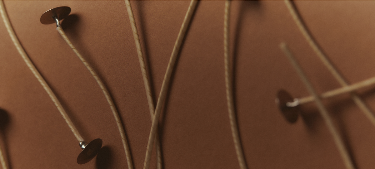 Candle wicks on a brown background