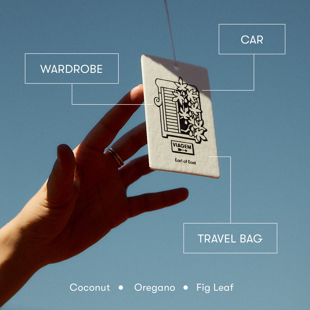 Viagem, Air Freshener by Earl of East, held up, labelled for wardrobe, car and travel bag use