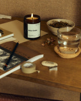 Atlas Cedar Scented Candle 170ml styled in a study or studio setting