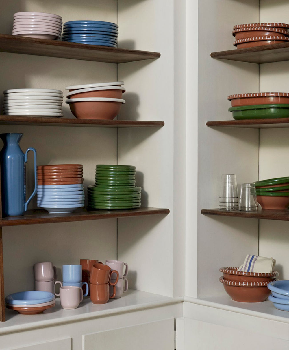 Barro Plate set of 2, Ø24, Green by HAY, on open kitchen shelves