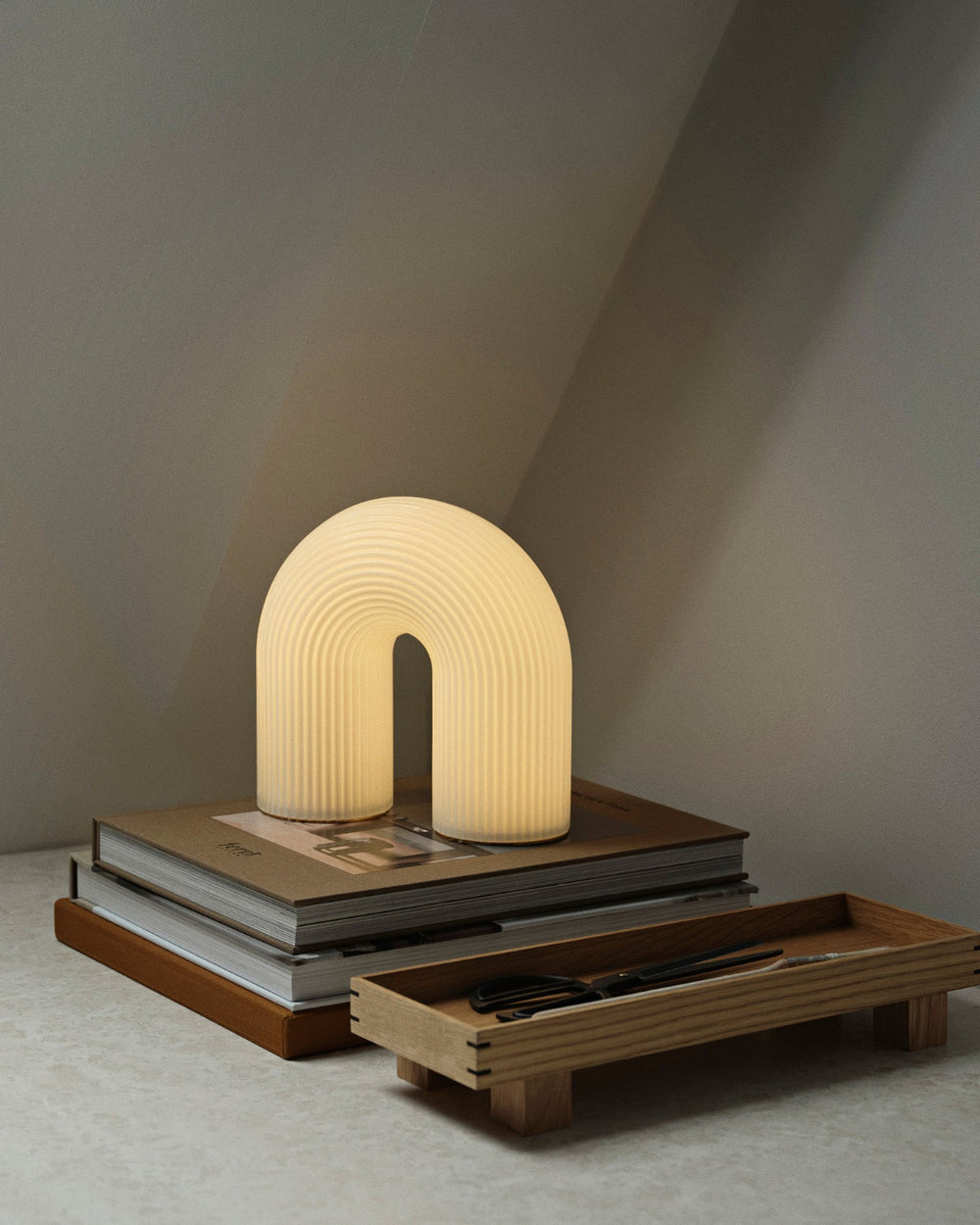Bon Wooden Tray, X Small, Oak by ferm LIVING, with a ceramic arch ornament