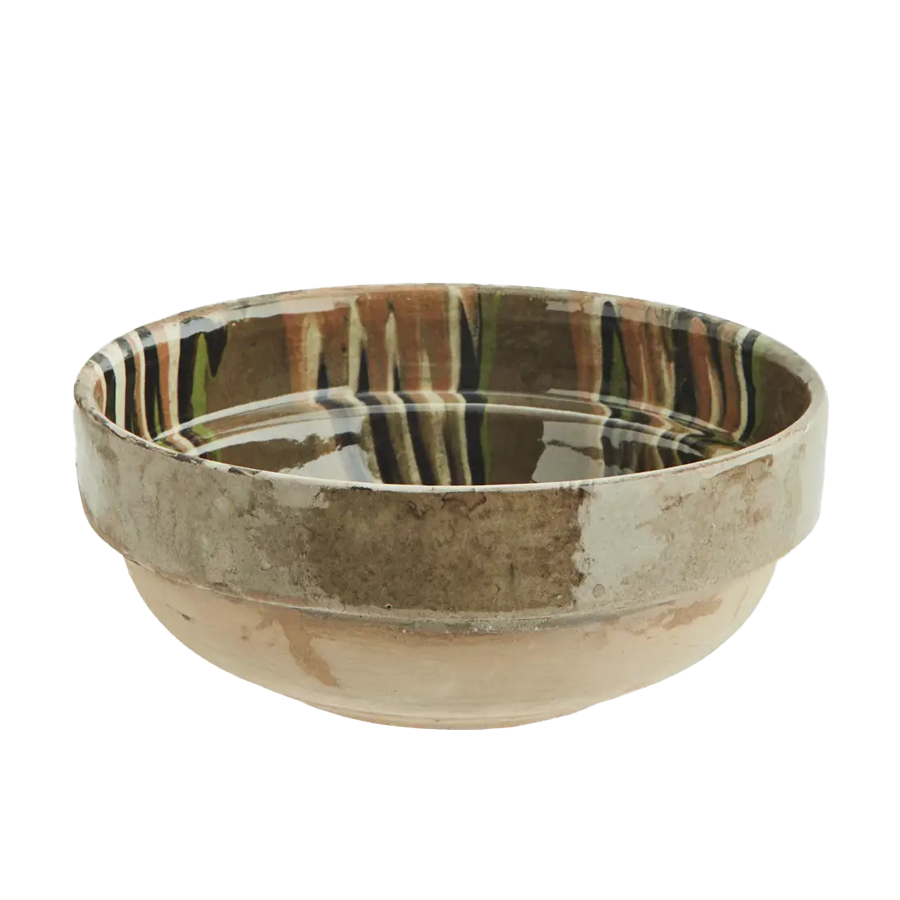 Hand-glazed bowl with green and orange swirls