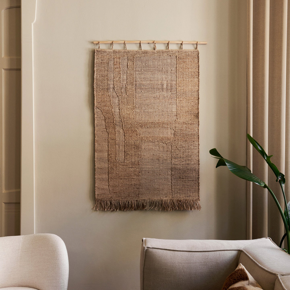 Harvest Wall Rug, Large by ferm LIVING, hanging above a sofa