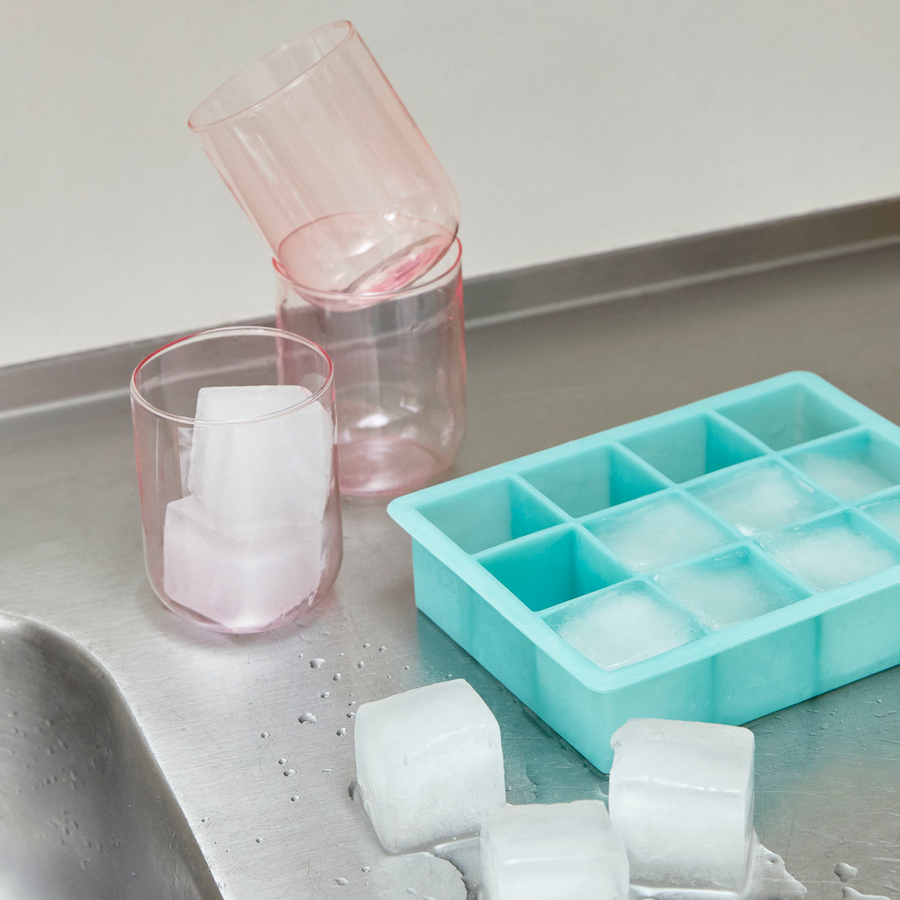 Ice Cube Tray, Square, XL by HAY, with ice beside a glass