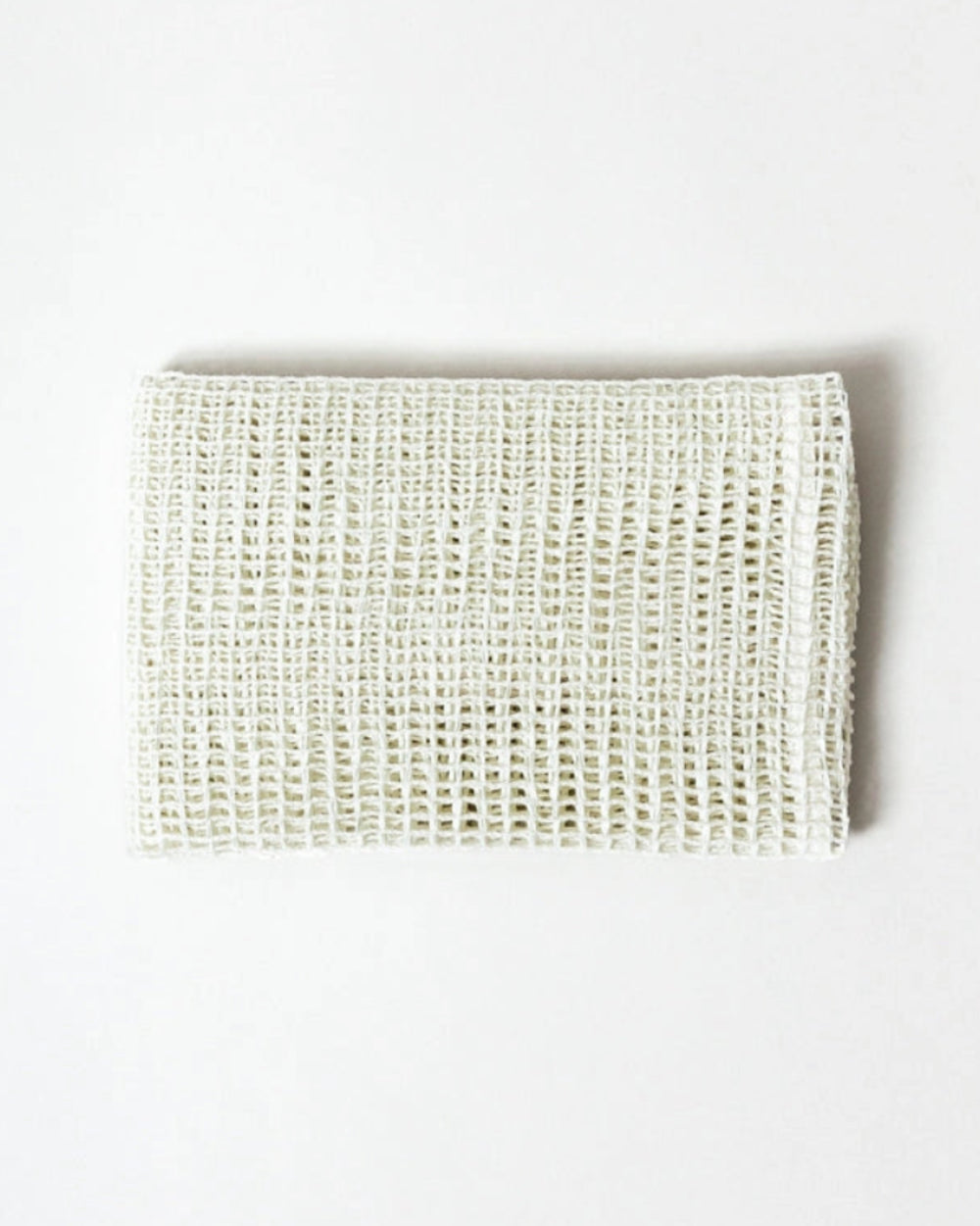 Sasawashi Open Weave Exfoliating Towel by Morihata, folded