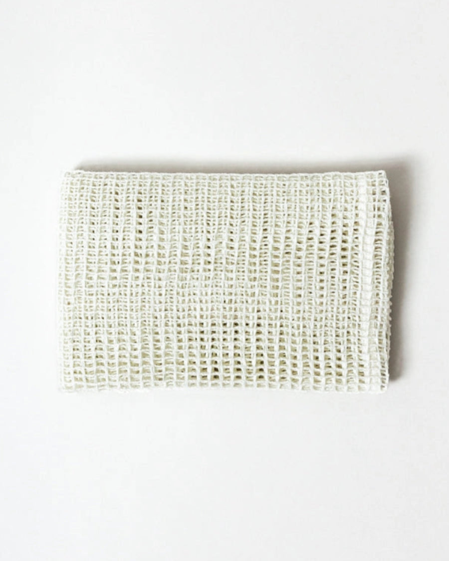 Sasawashi Open Weave Exfoliating Towel by Morihata, folded