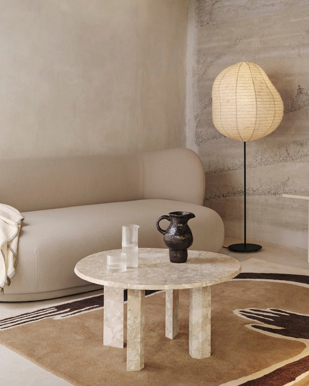 Doro Jug, Coffee by ferm LIVING, on a coffee table in a living room