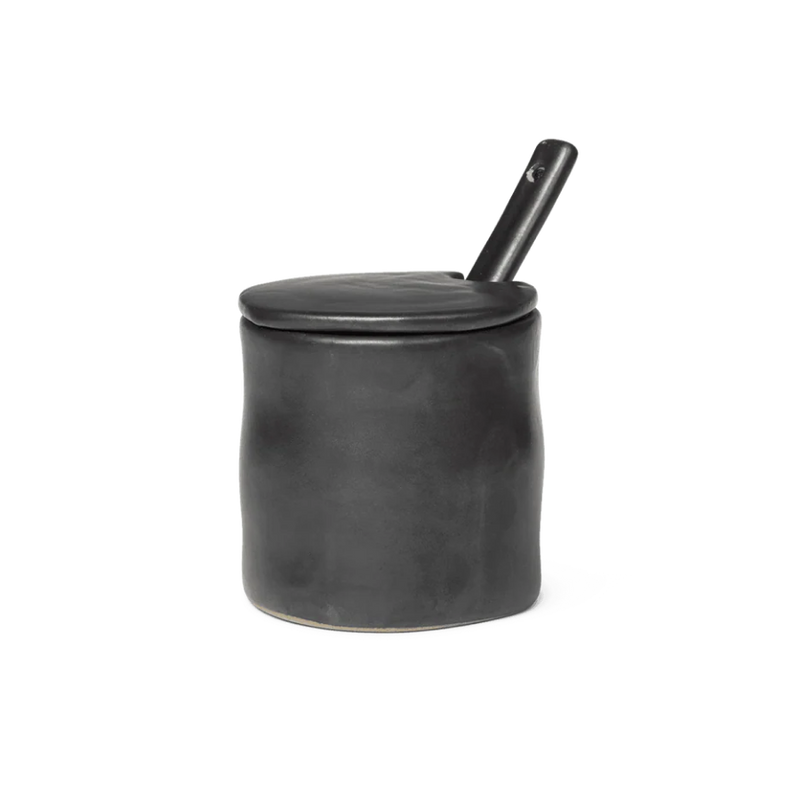  Black lidded jam jar with a spoon 