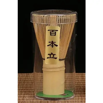 Handcrafted Matcha Whisk, Bamboo by Gohobi, on a rattan mat