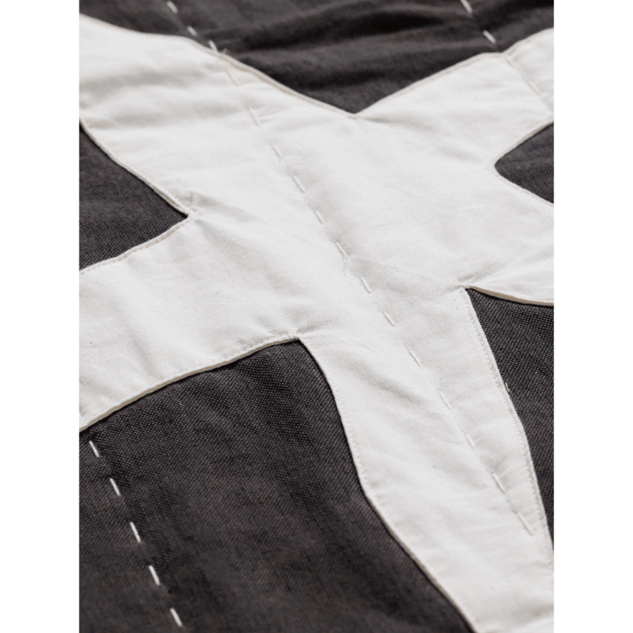 Kove Applique Quilted Blanket, Charcoal/Elm Green by ferm LIVING, close-up of the appliqué