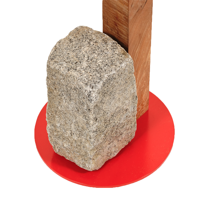 Heavy Light by Mitre & Mondays, weighted by a stone block