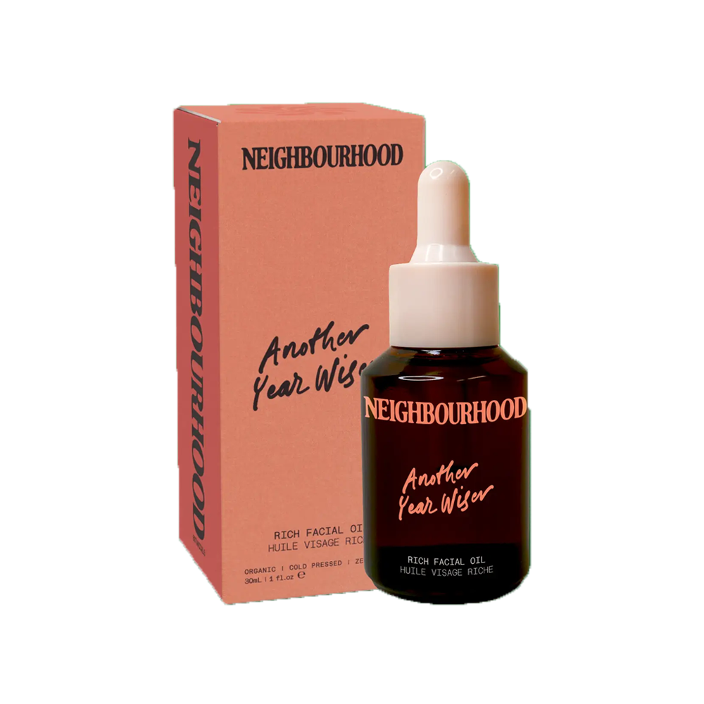 Another Year Wiser Facial Oil, 30ml by Neighbourhood Botanicals, beside its pink box