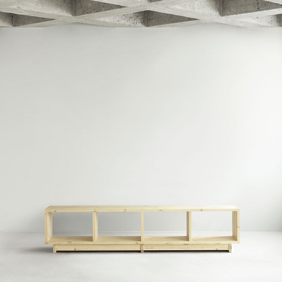 Fyr Bookcase, Pine, Medium by Normann Copenhagen, in a white room
