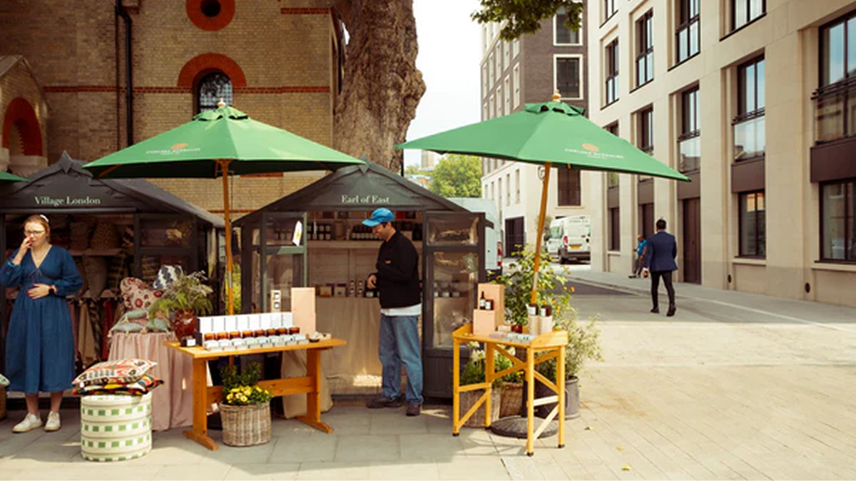 Earl of East market stall at Chelsea under green umbrellas