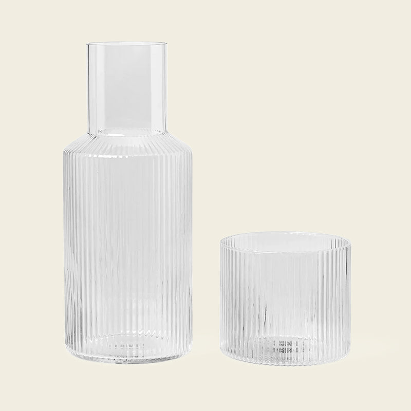  Ripple Carafe Set, Small, Clear by ferm LIVING, on a cream background 