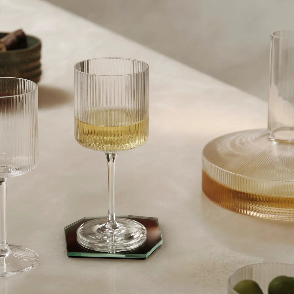 Ripple White Wine Glasses, Set of Two, Clear by ferm LIVING, holding white wine
