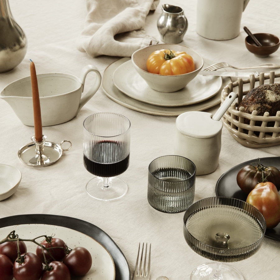 Flow Jam Jar, Off White by ferm LIVING, on a set breakfast table