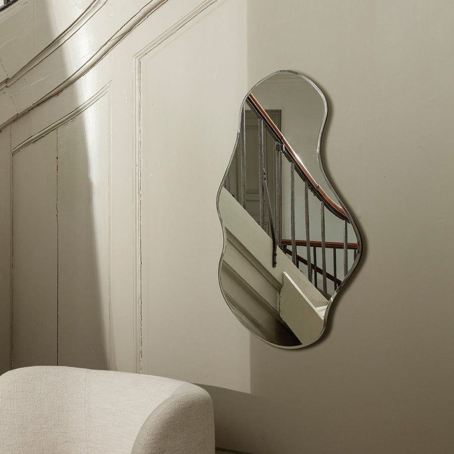 Pond Mirror, Large, Dark Chrome by ferm LIVING, on a white wall