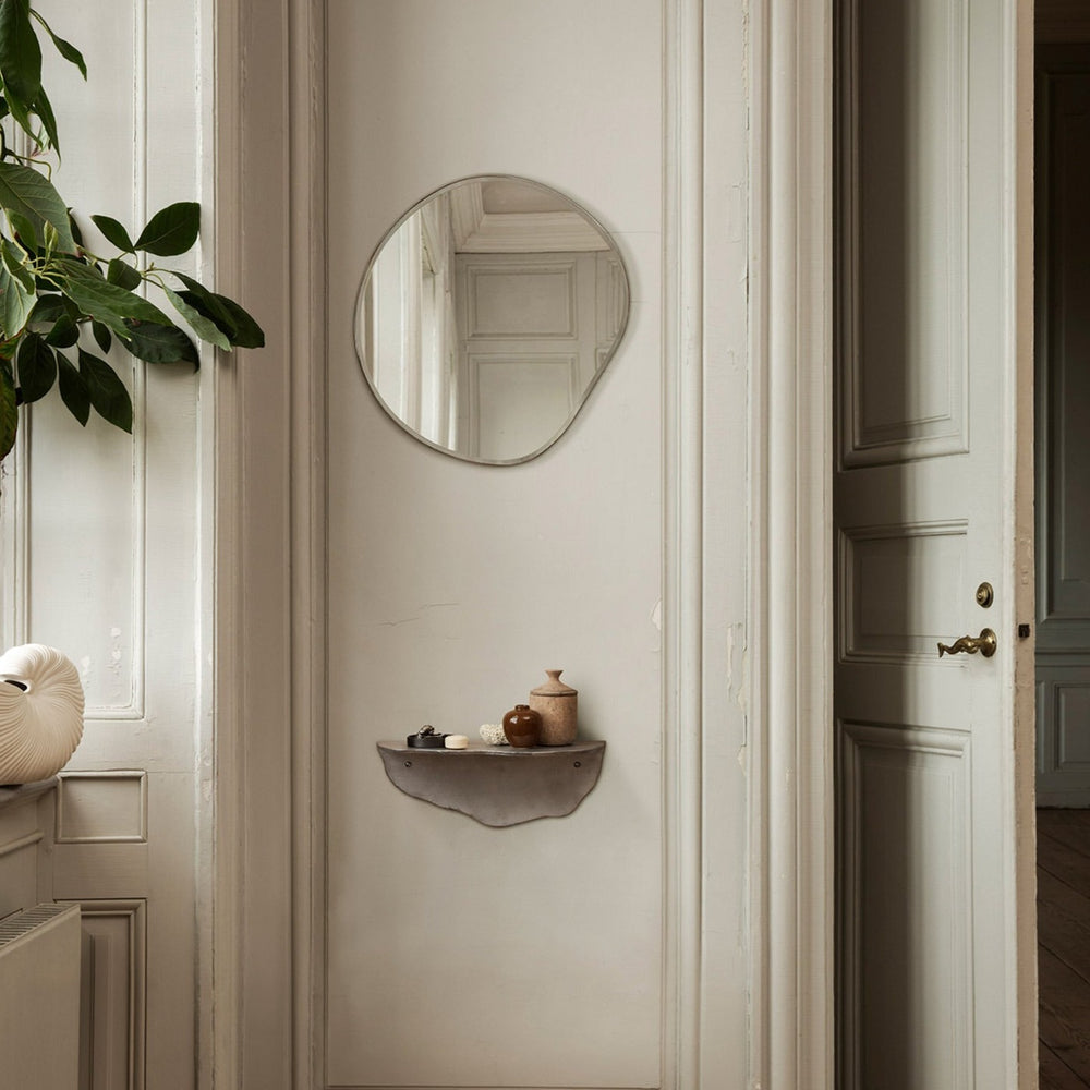 Pond Mirror, Small, Dark Chrome by ferm LIVING, in a hallway