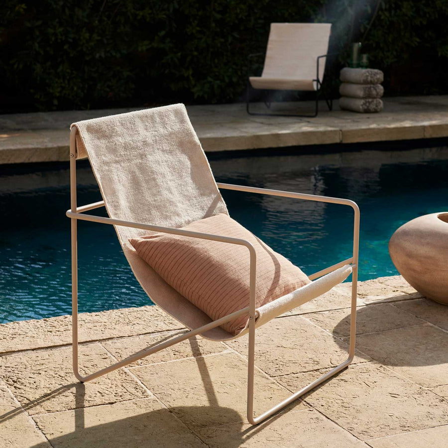 Desert Lounge Chair, Cloud Cover by ferm LIVING, by a swimming pool